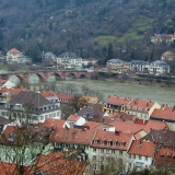 The river Neckar runs next to the Heidelberg old town under the Alte Brcke