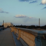 The Arlington Memorial bridge, the Lincoln and Washington memorials in the background