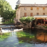 The Sorgue flows through Fontaine-de-Vaucluse