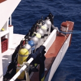 Compressed air bottles in line at the boat deck