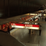 Escalators, the platform and a subway train at the Hakaniemi subway station