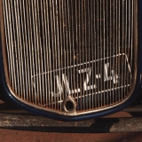 Lisence plate behind bars