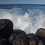 Waves hitting a breakwater