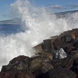 Waves hitting a breakwater