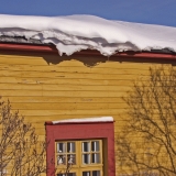 Snow on top of a house