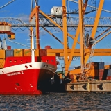 Container ship Sea Containers V is being loaded