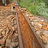 Dirt being run in the sluice box