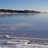 Bunches of ice on a frozen Aurinkolahti bay