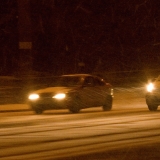 Cars in a blizzard at Mannerheimintie