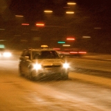 A cab in a blizzard at Mannerheimintie