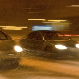 Cars in a blizzard at Mannerheimintie