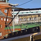 A tram in front of Hakaniemi market hall