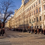 A crowd waits for the penkkarit trucks at Pohjoisesplanadi