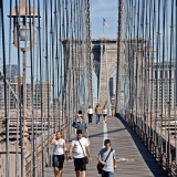 People walking on Brooklyn bridge