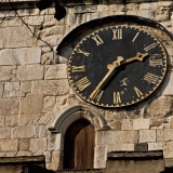 A dial plate in a church tower