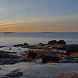 View south from Suomenlinna's Susisaari island, the approaching M/S Viking XPRS and Harmaja lighthouse in the background