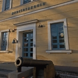 A cannon in front of the main building of the Finnish naval academy