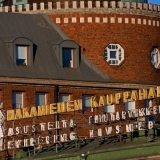 The neon sign at Hakaniemi market place