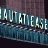 A neon sign at the railway station