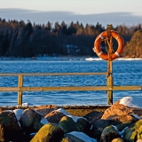 Rocks and a life buoy at the tip of Srkiniemi