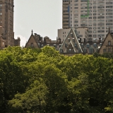 The Dakota peeks behind Central Park trees