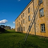 A ladder to the roof of an apartment building