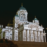 The light installation Heijastuksia - Reflections by Mikki Kunttu illuminates the Helsinki cathedral