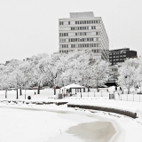 Kallio city office building and a wintery Tokoinranta