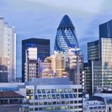 The Gherkin with nearby buildings