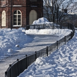 A fence leading to the tower