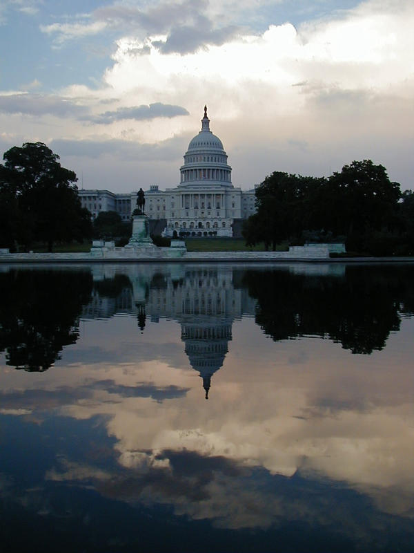 Capitol Hill and its reflection from the reflecting pool