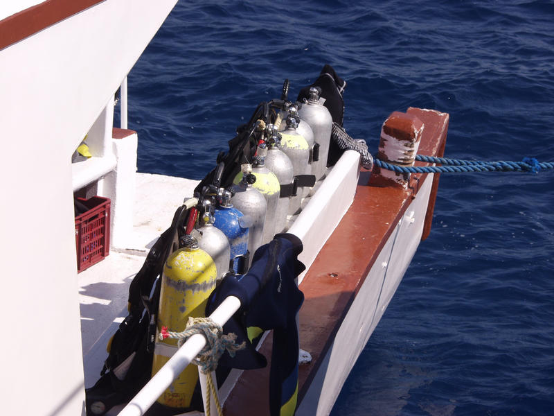 Compressed air bottles in line at the boat deck