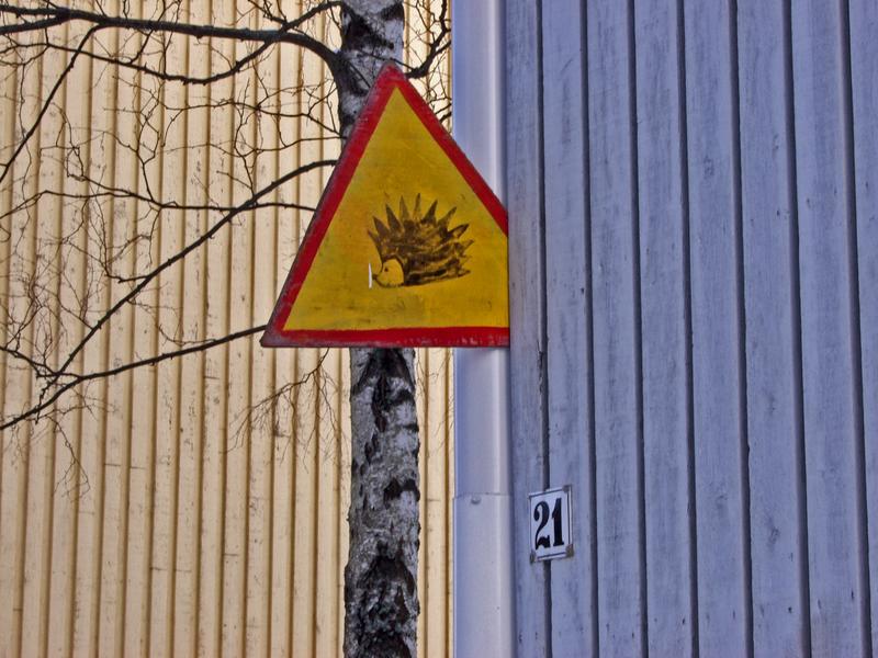 A warning sign for hedgehogs at Limingankatu