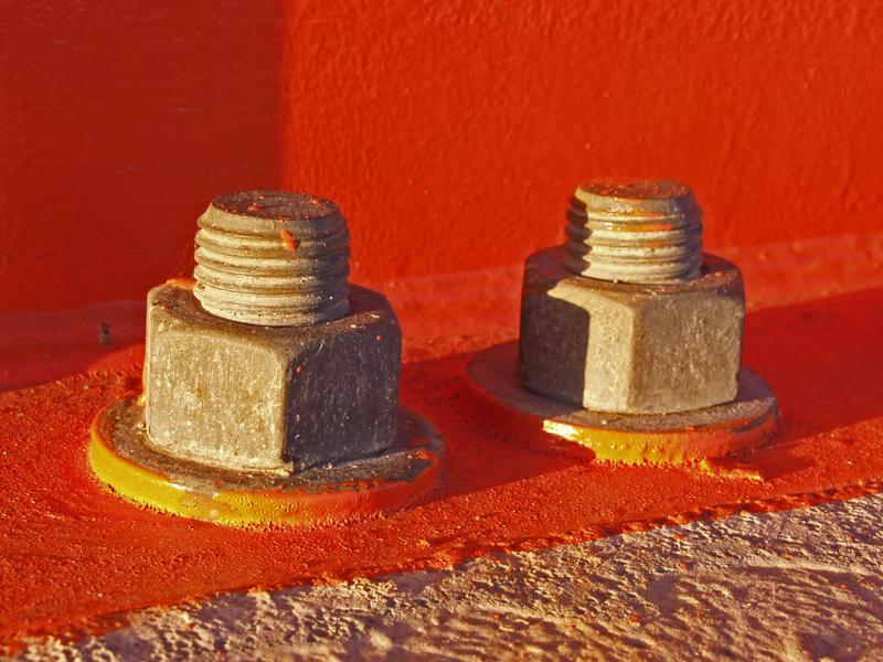 Nuts in the High tech center's supporting pillar