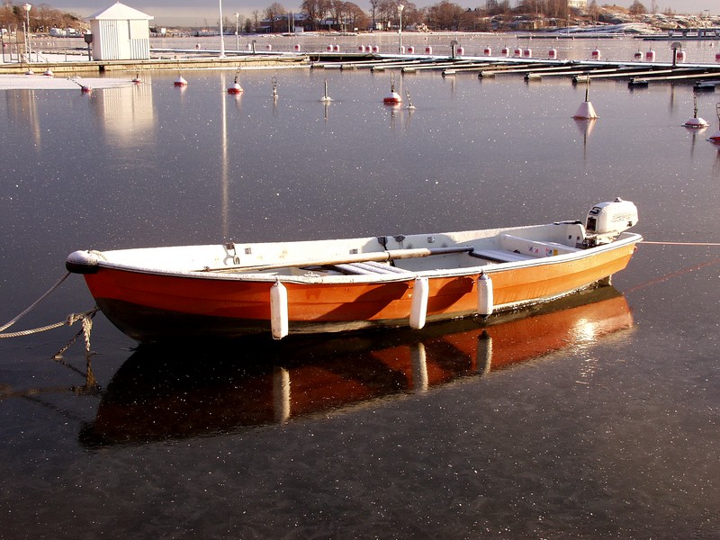 A boat surrounded by ice