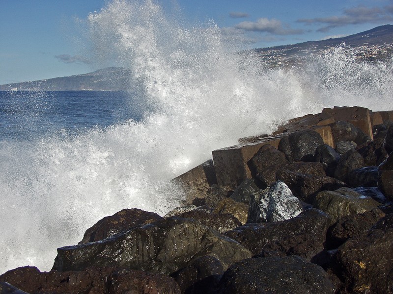 Waves hitting a breakwater