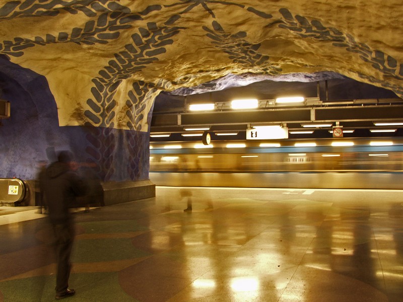 Subway platform and a train passing by