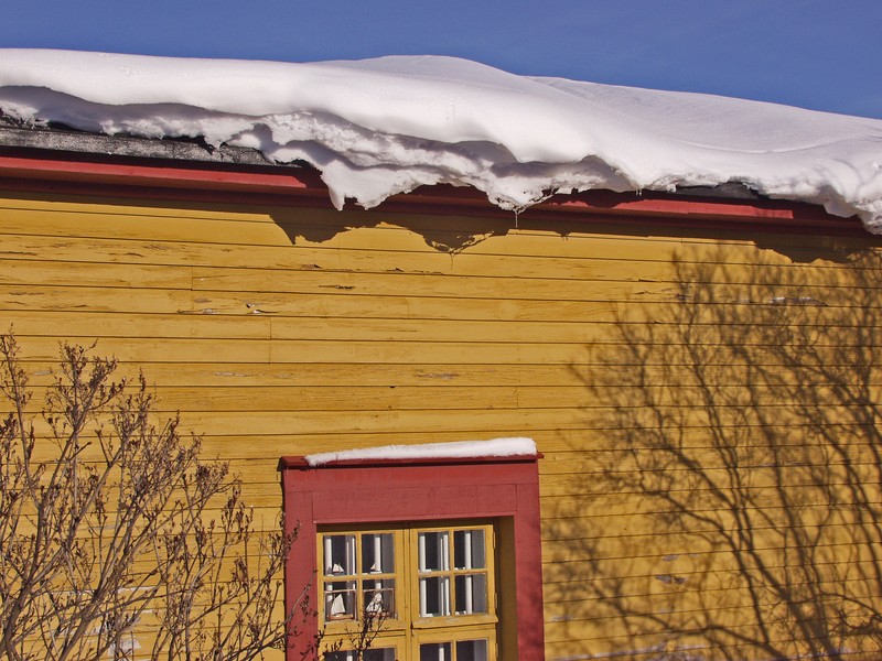 Snow on top of a house