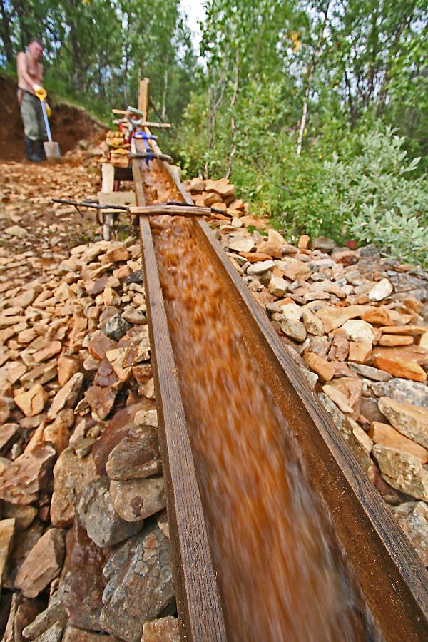 Dirt being run in the sluice box