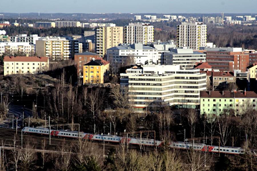 Pendolino train passing Alppila district