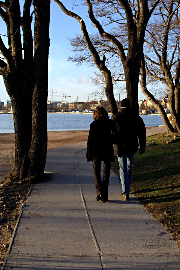 A couple walking at Uunisaari island