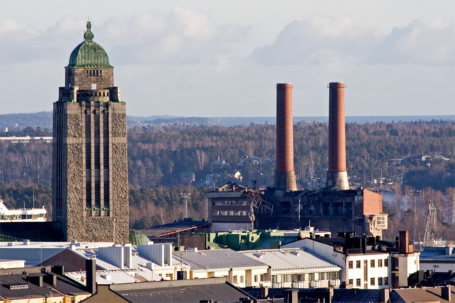 Kallio church bell tower and the power plant at Hanasaari where demolition is underway