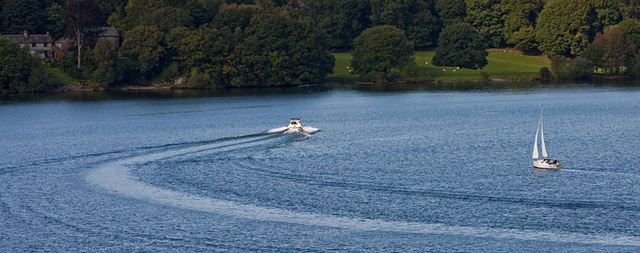 A motorboat and a sailboat at Lake Windermeere