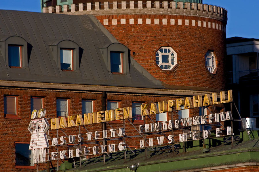 The neon sign at Hakaniemi market place