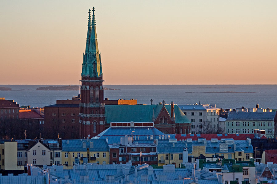 St. John's church rises over the roofs of southern Helsinki