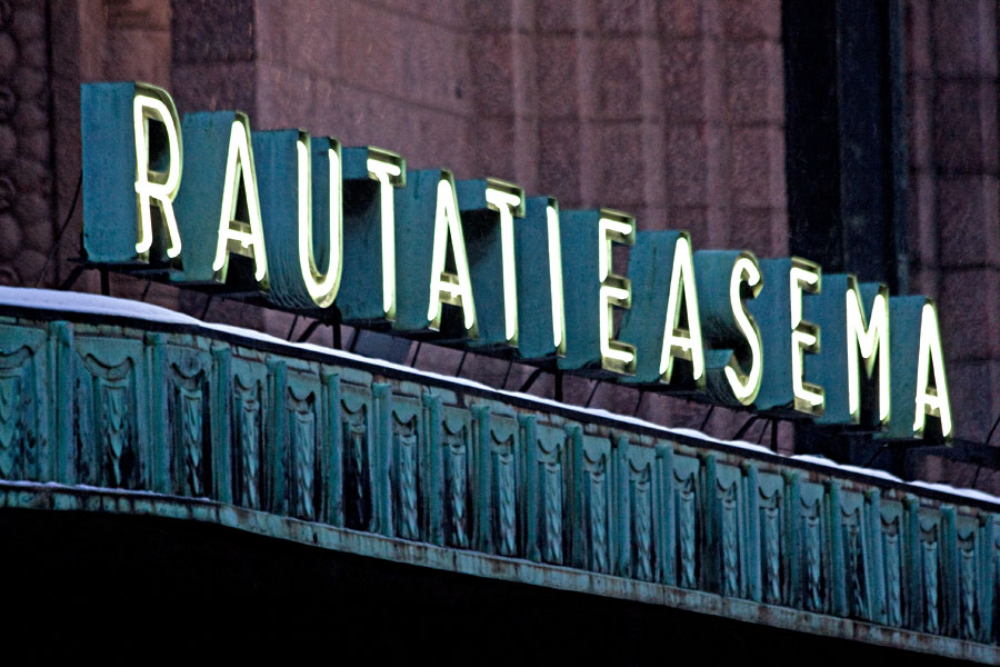 A neon sign at the railway station