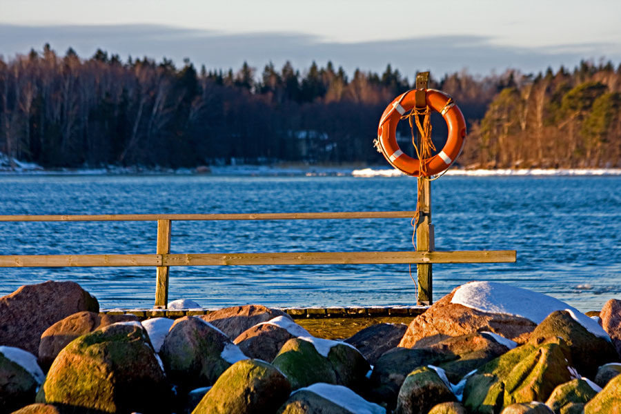 Rocks and a life buoy at the tip of Srkiniemi