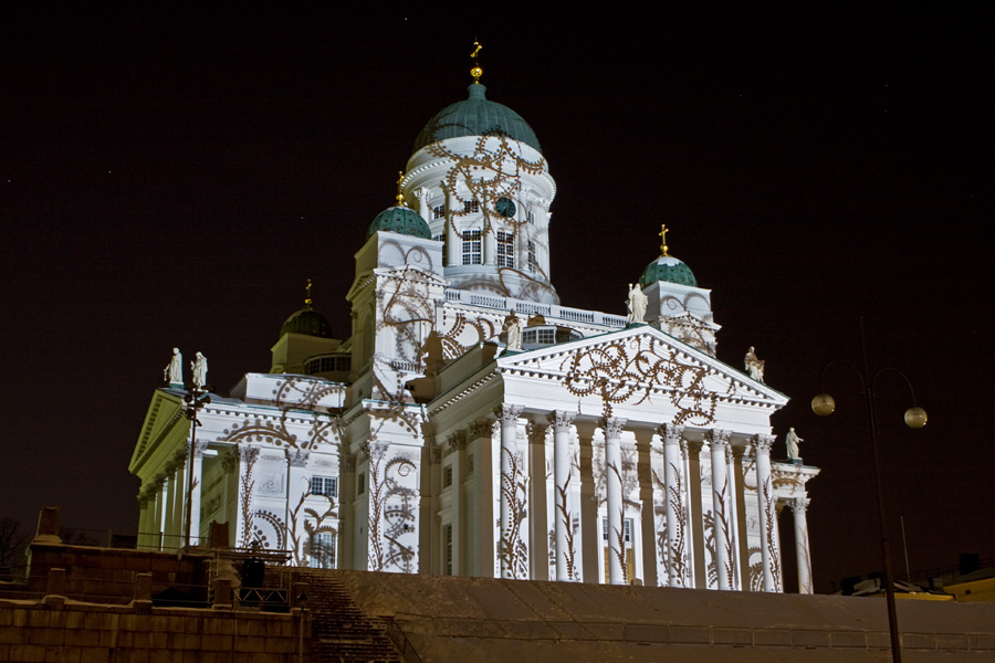 The light installation Heijastuksia - Reflections by Mikki Kunttu illuminates the Helsinki cathedral
