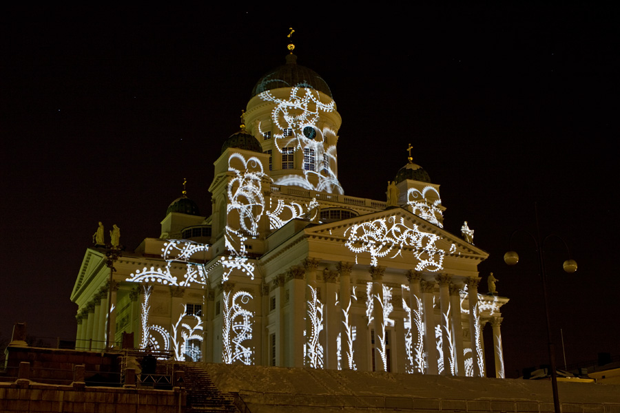 The light installation Heijastuksia - Reflections by Mikki Kunttu illuminates the Helsinki cathedral